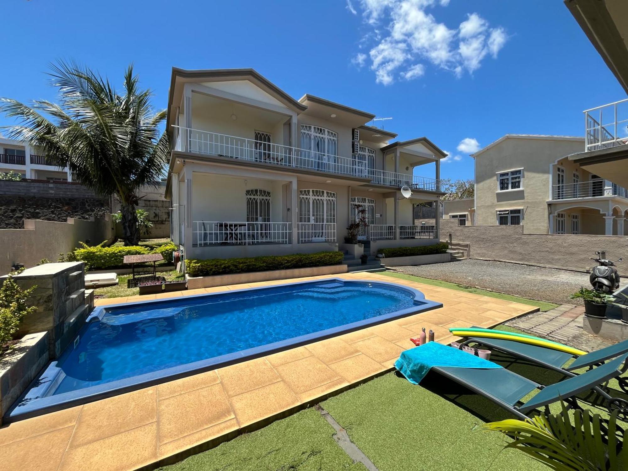 Tropical Retreats Apartment Flic en Flac Bagian luar foto