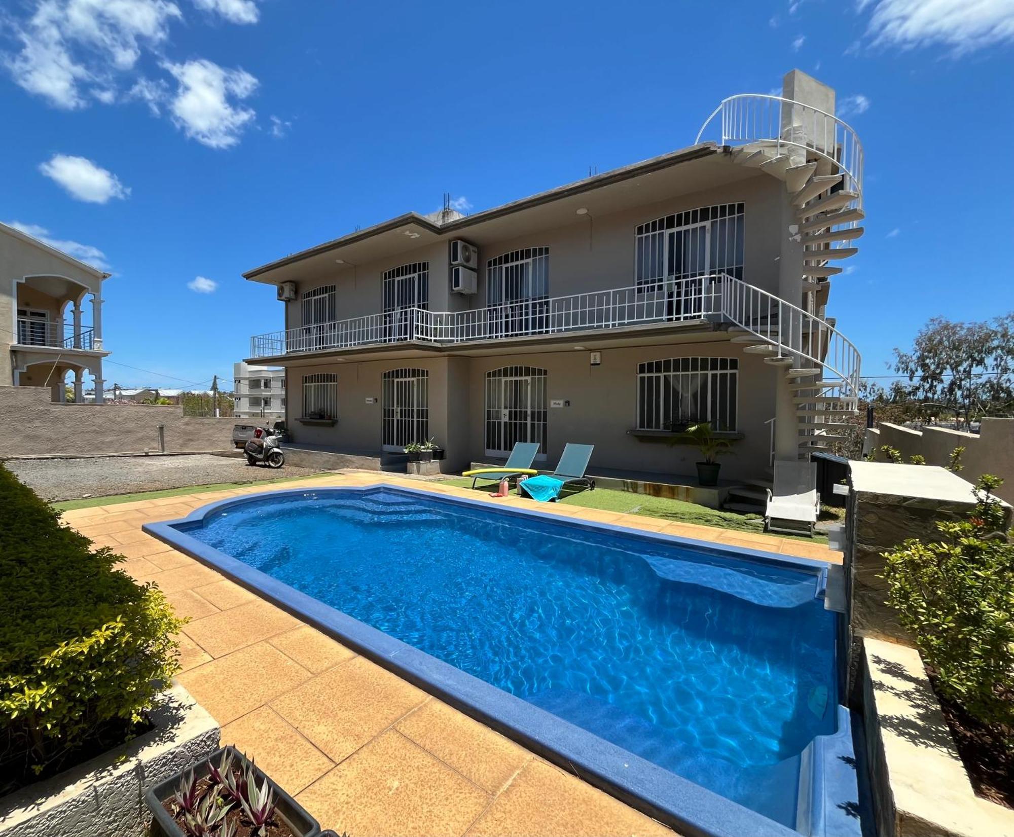 Tropical Retreats Apartment Flic en Flac Bagian luar foto