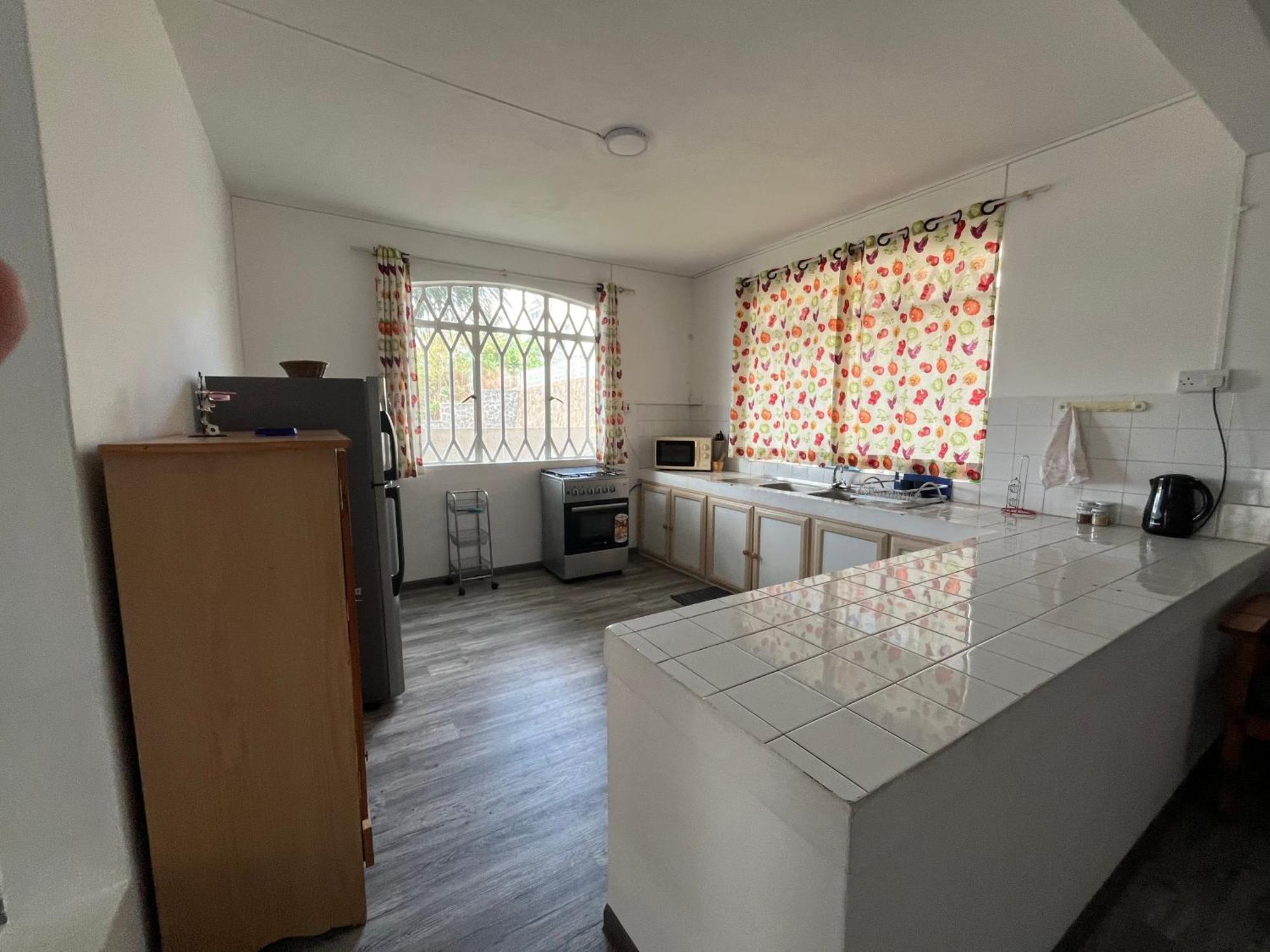 Tropical Retreats Apartment Flic en Flac Bagian luar foto